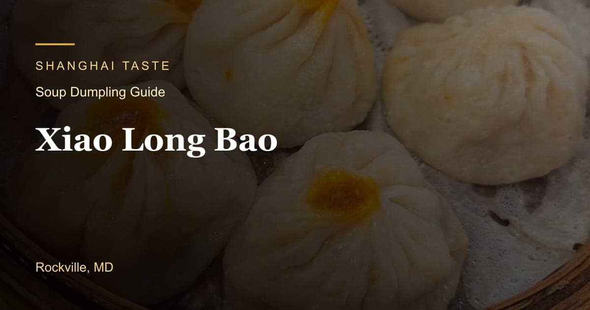 A bamboo steamer of handmade Xiao Long Bao soup dumplings at Shanghai Taste